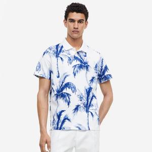 เสื้อโปโลสำหรับผู้ชายแบบลำลองเสื้อโปโลผ้าฝ้าย100% แขนสั้นระบายอากาศพิมพ์ลายเขตร้อน - Product Image 1