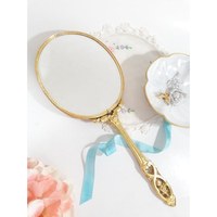 Miroir de maquillage à main de style antique, miroir en métal plaqué or vintage avec poignée décorative, accessoire de décoration pour salon et maison