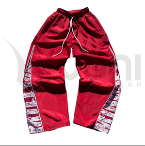 กางเกงแทร็คทรงโอเวอร์ไซส์เอวสูงแบบยูนิเซ็กซ์ ขากว้างทรงบอยเฟรนด์ ผ้าคอตตอนถัก ทรงจ็อกเกอร์ ปลายขาบาน ปักโลโก้ ดีไซน์ลำลอง - Product Image 1