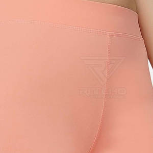 Low MOQ OEM Service Solid Mid Waist <b>Legging</b> for Women High Quality Yoga <b>Leggings</b> Fitness Wear in <b>Cheap</b> Price - Product Image 5