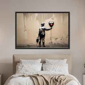 Déclaration d'amour urbaine : Art sur toile imprimé avec un ballon en forme de cœur de Banksy, toile encadrée noire - Product Image 1