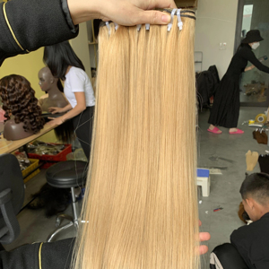 Rubio sedoso recto 100% vietnamita cabello blanqueado máquina de un solo donante trama de proveedor de Vietnam extensiones de cabello humano alto - Product Image 1