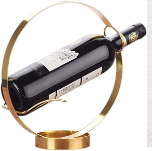 Porta copas de vino circular minimalista de metal dorado. Estilo moderno de mesa. Disponible a precio de mayoreo. - Product Image 1