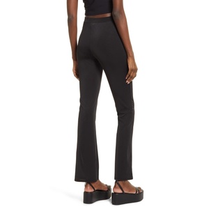 Pantaloni a Zampa Neri a Vita Alta di Taglia Media in Maglia Lucida con Dettagli Aperti - Product Image 2