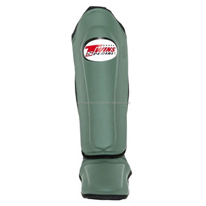 Espinilleras de boxeo de cuero genuino hechas a medida Nuevo diseño con logotipo Protección para adultos Espinilleras OEM Logotipo personalizado Espinilleras deportivas - Product Image 2