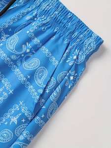 Pantalones cortos de verano informales para hombre al por mayor, estampado por sublimación transpirable con patrón sólido, logotipo OEM personalizado en la cintura - Product Image 4