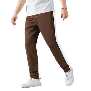 Pantalon pour hommes de qualité supérieure poche latérale cordon de serrage taille entraînement pantalon de survêtement ajusté pour hommes pantalon de rue - Product Image 1