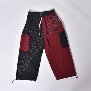 2025 confortable imperméable coupe-vent pantalon taille élastique hommes pantalon couleur unie surdimensionné pantalon ample avec grande poche - Product Image 1