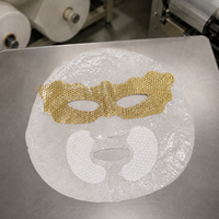 Masque facial composite double couche Y486 en fibres végétales avec base en coton texturé or pour les yeux et perle pour la bouche