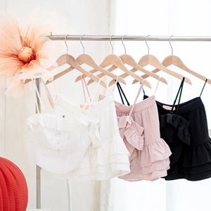 Femmes décontracté asymétrique haut court ensemble nouveauté respirant tricoté Spandex/Polyester court sans manches débardeurs en gros - Product Image 1