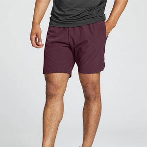 กางเกงขาสั้นเล่นยิมของผู้ชายกางเกงขาสั้นสำหรับวิ่งแห้งเร็วระบายอากาศได้ดีสีพื้น - Product Image 1