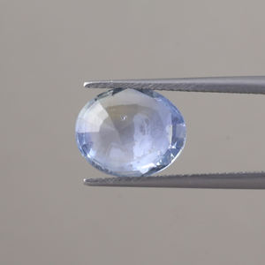 Lab Created Blue Sapphire Loose Gemstone | 12x10mm Oval Cut | 5.38 Carat <b>Polished</b> IGI Certified Genuine Sapphire Phosphorescent - Product Image 3