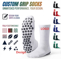 Chaussettes de football personnalisées à forte valeur ajoutée Chaussettes à prise en main d'usine Chaussettes antidérapantes