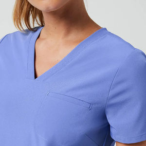 Uniforme médico para mujer de ajuste cómodo, confeccionado con tela elástica transpirable que proporciona fácil movilidad, tacto suave y durabilidad confiable. - Product Image 5