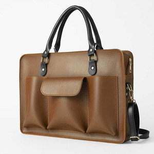 Sac à ordinateur portable en cuir simple et élégant pour hommes, grande capacité, design confortable pour le transport, idéal pour le travail de bureau et les activités quotidiennes - Product Image 1
