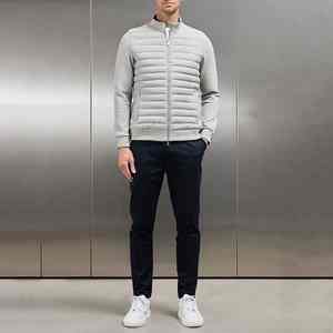 Chaqueta de plumón ligera para hombre con cuello alto Abrigos de punto empalmados de otoño e invierno Servicio OEM disponible - Product Image 2