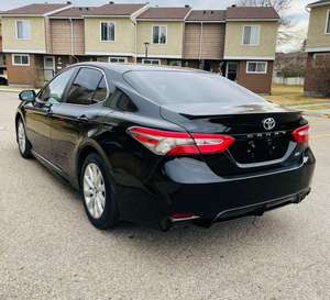 Toyota Camry XSE 2019 d'occasion, berline, moteur essence 8L, boîte automatique, pneus R17, sièges en cuir, conduite à gauche, couleur foncée - Product Image 3