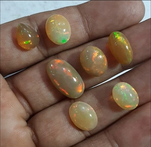 10-17mm environ naturel opale éthiopienne lisse Cabochon pierre précieuse forme ovale haute qualité forme libre Cabochon pierre pour la vente en gros - Product Image 1
