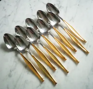 ชุดช้อนเสิร์ฟของหวานสีทองสุดหรูทำจากสเตนเลสสตีลพร้อมการตกแต่งที่หรูหราเหมาะสำหรับใช้บนโต๊ะอาหารอย่างมีสไตล์ - Product Image 5