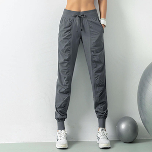 Joggers de cintura elástica alta para mujer, pantalones de Yoga de entrenamiento de patrón sólido de estilo frontal plano con cierre ajustable para invierno - Product Image 6