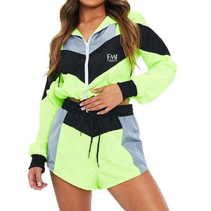 Tenues fermeture éclair avant taille élastique deux pièces ensembles avec emballage personnalisé femmes été coupe-vent ensembles - Product Image 1