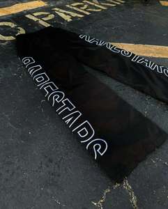 Ropa de calle personalizada de alta calidad, pantalones de chándal acampanados de nailon, pantalones de chándal informales holgados con estampado lateral para hombre, pantalones cortavientos - Product Image 1