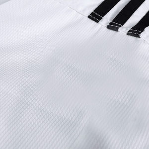 Uniforme de Taekwondo Dobok de Poliéster/Algodón al por Mayor, Logotipo Personalizado Bordado, Color Personalizado, Duradero, Antiencogimiento, Artes Marciales - Product Image 2