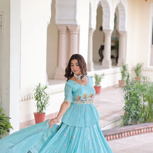Lehenga bleu ciel moderne et élégant avec broderie multi-fils Zari et sequins, orné de motifs dorés, accompagné d'un dupatta - Product Image 1