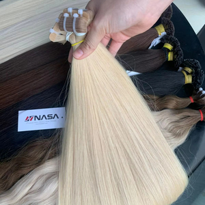 Venta al por mayor 100g Tape-In Hair Extensions Baby Thin Premium All-Color Vietnamese Raw Virgin Straight Wavy Normal Tape - Product Image 1