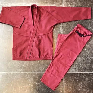 Conjuntos de Gi de Judo Hechos a Medida, Ropa Deportiva para Adultos con Colores Personalizados, Tela Transpirable de Poliéster/Algodón y Opciones de Logotipo Personalizado - Product Image 1