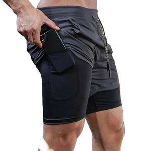 OEM Men Sports 2 in 1 Shorts With Pockets Custom Logo Mens Gym Double <b>Layer</b> Workout Fitness 7'' Inseam Shorts - Product Image 1