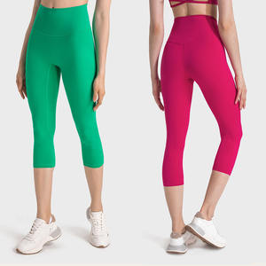 Collants de gymnastique athlétiques pour femmes 3/4 longueur taille haute Capris bout à bout couleurs unies sans couture avant beurre tissu poches sans couture - Product Image 6
