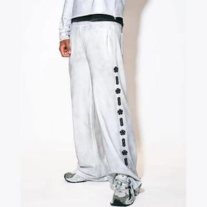 กางเกงวอร์มฮิปฮอปคุณภาพสูงสั่งทำพิเศษ ล้างสีแบบแอซิดวอช ขาดๆ แบบวินเทจ ทรงขากว้างหลวมๆ ประดับด้วยคริสตัล พิมพ์ลายสกรีน - Product Image 3