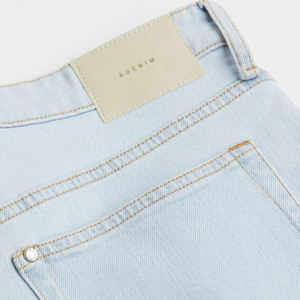 Short en jean d'été décontracté à taille haute en tissu Oxford pour femmes Short taille haute respirant et délavé avec logo personnalisé pour femmes - Product Image 4