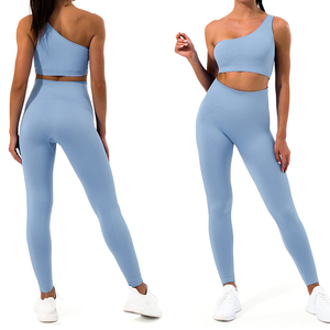 Conjunto deportivo de leggings y sujetador deportivo sin costuras de un solo hombro para mujer, de cintura alta, color liso, para yoga y entrenamiento. - Product Image 1