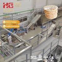 Mini machine à snacks de riz Ligne de production de craquelins de riz à haute efficacité Machine de fabrication de gâteaux de riz soufflé