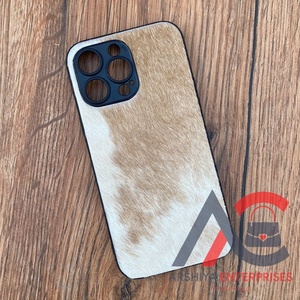 Nuova custodia per telefono in pelle con <span class=keywords><strong>capelli</strong></span> genuini in pelle di vacchetta occidentale custodia per telefono di lusso Vintage personalizzata per telefono 15 Pro Max - Product Image 1