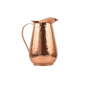 Jarra para servir jugo de diseño fantástico en jarra de agua potable martillada de cobre para uso en eventos de boda y restaurantes - Product Image 1