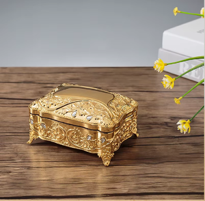 Vintage gold rectangular <b>trinket</b> <b>box</b> with embossed details, available at wholesale prices. to Elevate Your Collection - Product Image 1