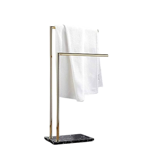 Porte-serviettes rotatif en métal marbré de luxe avec organisateur de salle de bain autoportant durable et écologique pour intérieurs modernes et élégants - Product Image 1