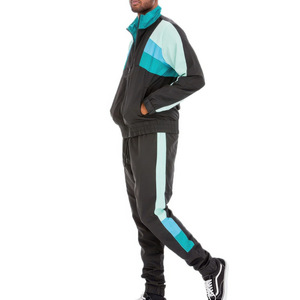 Ensemble de survêtements coupe-vent à la mode pour hommes et femmes Service OEM ODM Vêtements de sport étanches 2 pièces avec logo personnalisé - Product Image 4