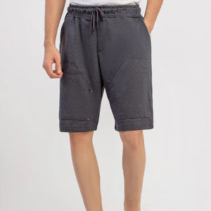 กางเกงขาสั้นวินเทจไซส์ใหญ่พิเศษสำหรับผู้ชายสไตล์สตรีทแบบสีทึบ - Product Image 1