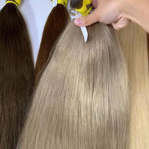 Calidad de lujo a granel 100% Raw 24 pulgadas Natural ondulado vietnamita extensiones de cabello humano fuerte sedoso 100g paquetes colores súper ligeros - Product Image 1