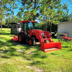 Tracteur agricole compact Kubota BX23S avec chargeur frontal. - Product Image 5