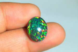 โอปอลทรงหลังเบี้ยสีดำโอปอลทรงวงรีสีดำสำหรับทำเครื่องประดับอัญมณีโอปอลสีดำขัดเงาเรียบ8-10Carat ขนาดใหญ่ - Product Image 5