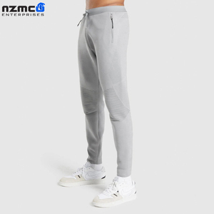 Pantalones de chándal de felpa francesa de peso pesado personalizados al por mayor 100% algodón cintura alta lavado oscuro estilo casual apilado estilo de las mujeres de los hombres - Product Image 3