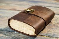 Vente en gros de carnets en cuir véritable vintage faits à la main de 7x5 pouces, avec bordure festonnée, papier en coton écologique, fournisseur OEM avec logo personnalisé