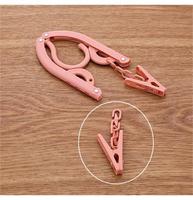 Cintre en plastique multifonctionnel Cintre télescopique en plastique pliable avec clips pour affaires/voyage