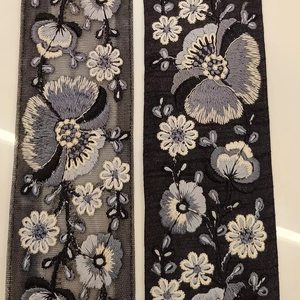 Tissu en dentelle brodée de haute qualité avec des motifs floraux élégants pour robes de mariée et robes de soirée sur tulle/filet - Product Image 1