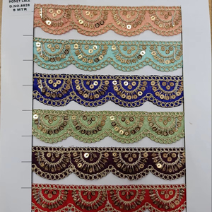 Tissu en dentelle brodée florale colorée vibrante et détaillée avec des motifs complexes, parfait pour la mode haut de gamme - Product Image 1